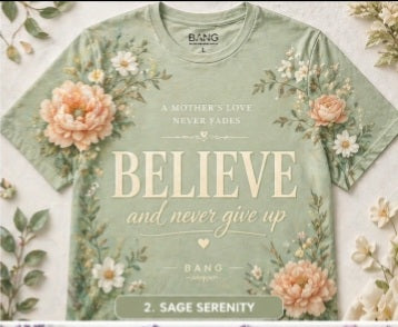 Green t-shirt with floral design and motivational text on a white background